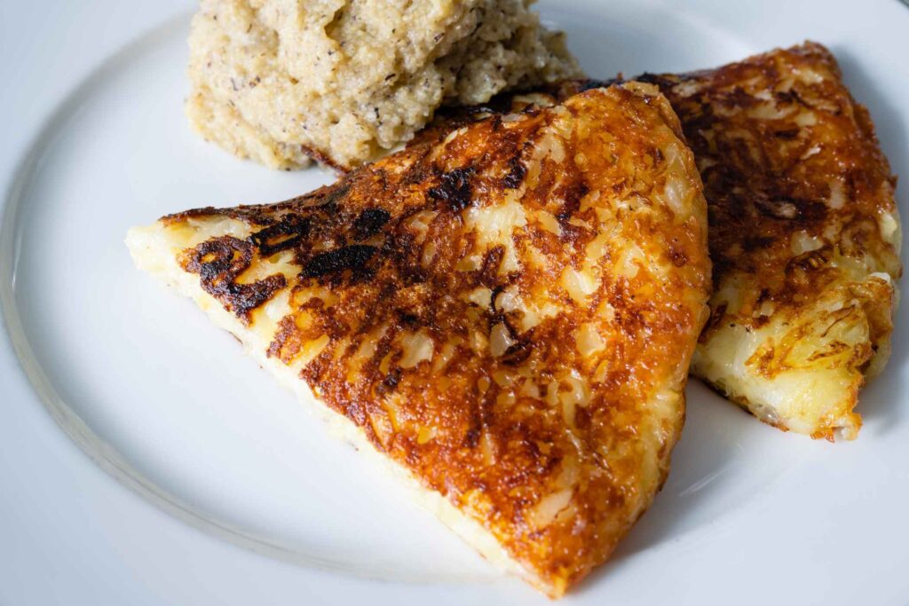 Crispy, Gooey Heritage: Mastering the Art of Friulian Frico -
