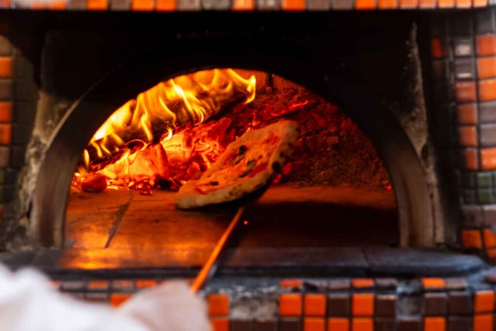 Smoldering Embers & Hearth Traditions: A Connoisseur’s Guide to Umbria’s Pizza Sotto Lu Focu 1 Smoldering Embers & Hearth Traditions: A Connoisseur’s Guide to Umbria’s Pizza Sotto Lu Focu -