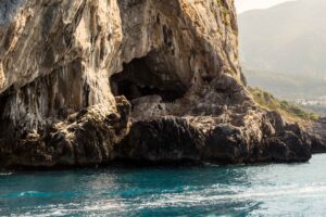 Azure Caverns & Limestone Cliffs: Boat Trips to Dino Island - Italy Experience Guide